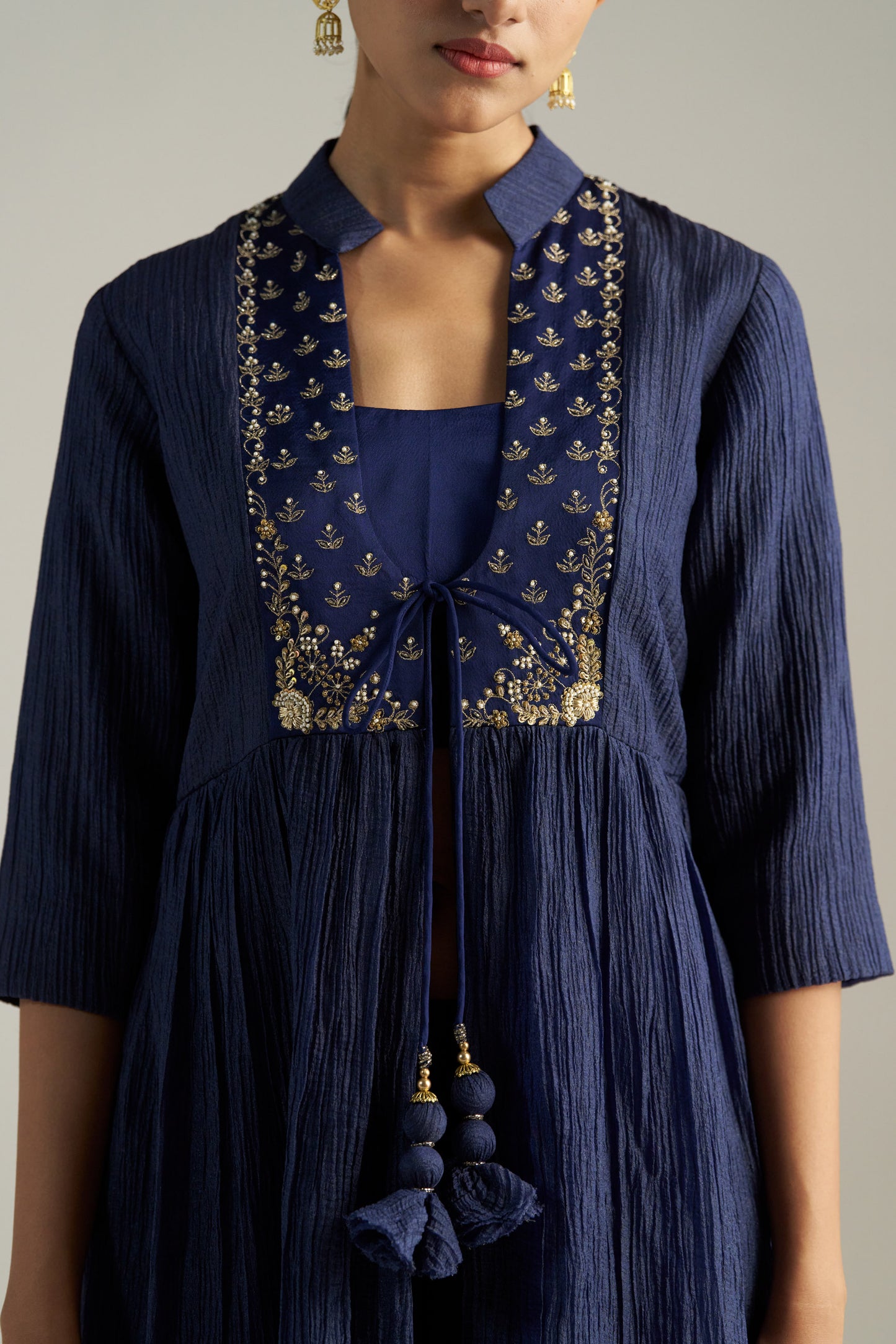 Blue Jacket Paired With Crop Top And Pants