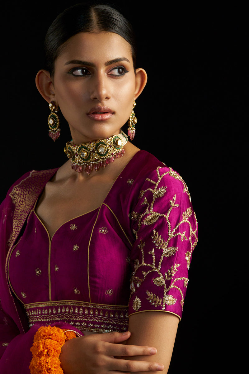 Magenta Brocade Lehengha Paired With Silk Blouse And Organza Dupatta