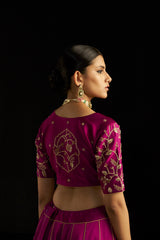 Magenta Brocade Lehengha Paired With Silk Blouse And Organza Dupatta