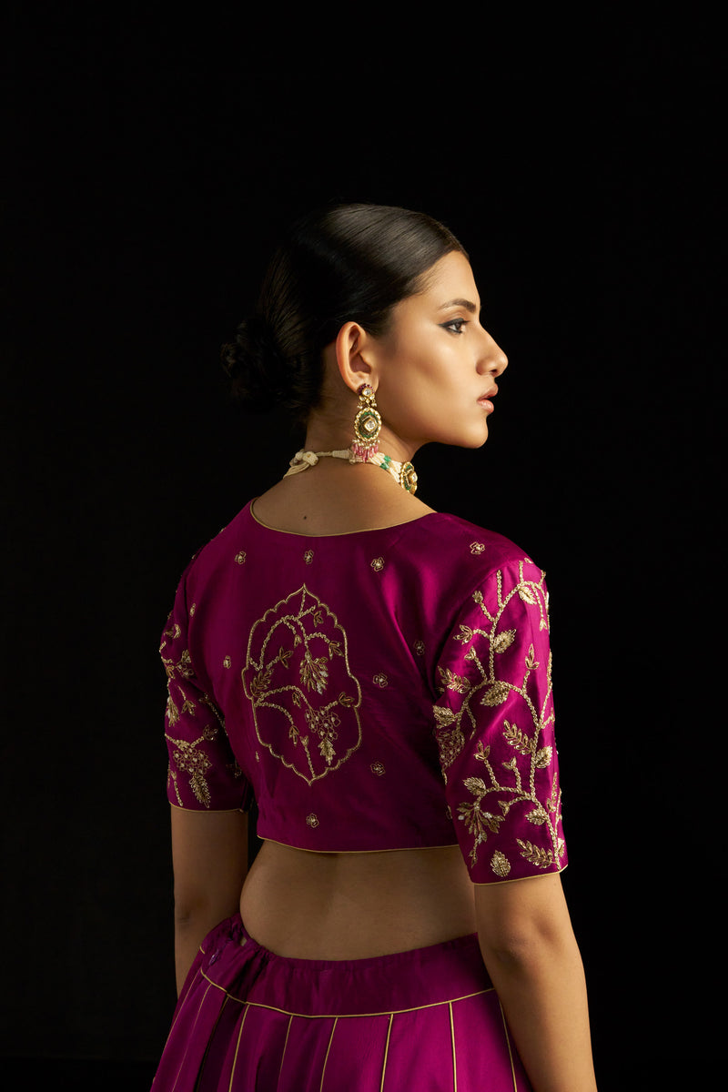 Magenta Brocade Lehengha Paired With Silk Blouse And Organza Dupatta