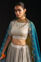 Powder Grey Silk Lehengha, Blouse With Hand Embroidered Details Paired With Shaded Dupatta